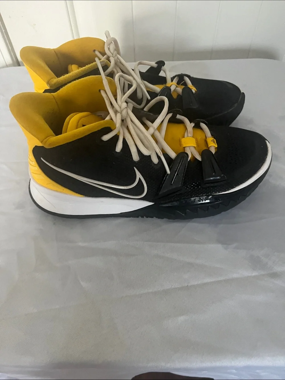 Nike Kyrie Black and Yellow High-Top Sneakers